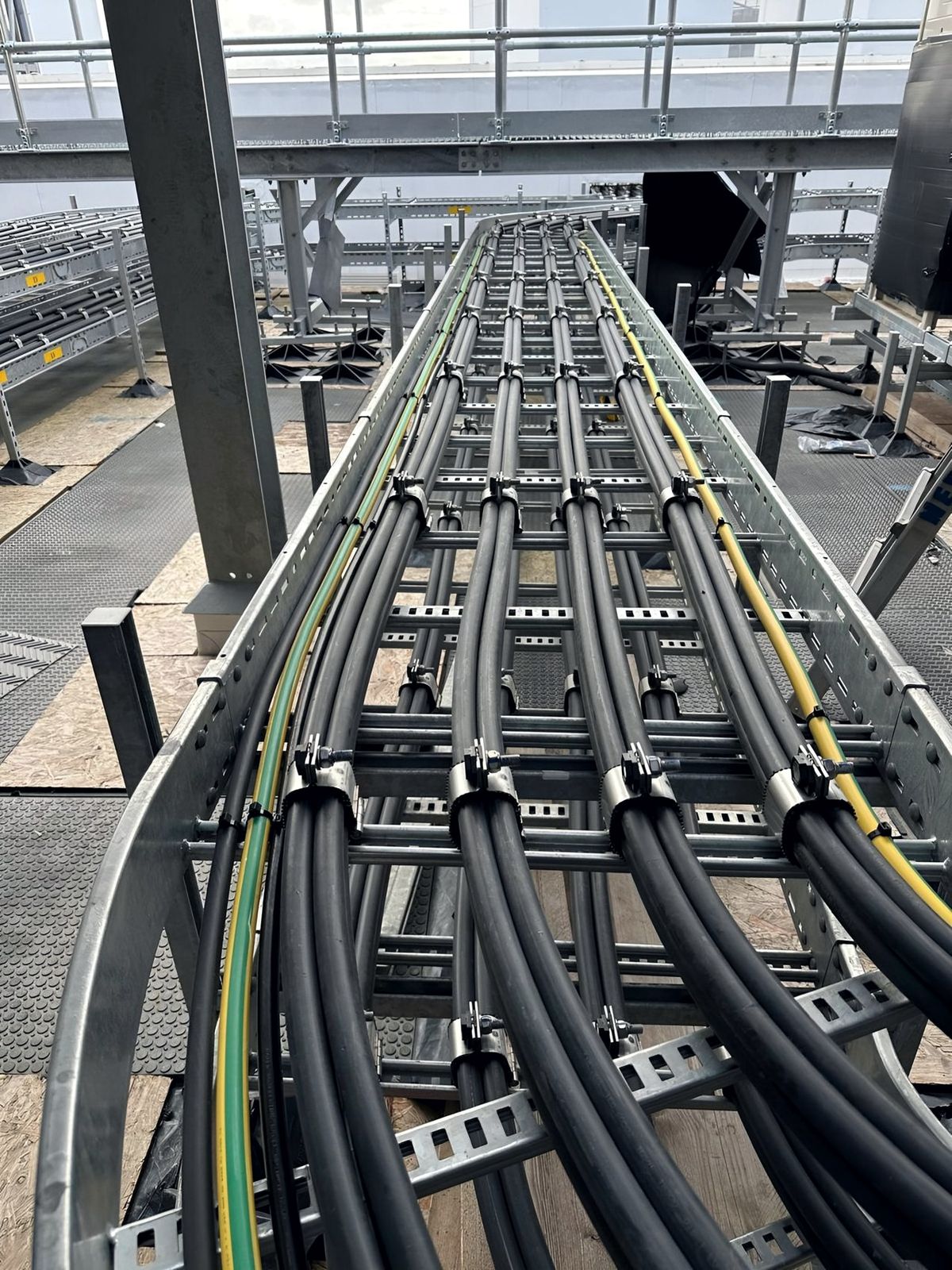 Dressed power cables on galvanised cable ladder at a data centre rooftop